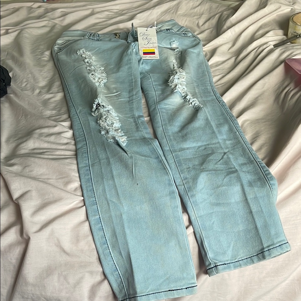 Women’s Light Blue Distressed Jeans